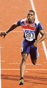 Harry Aikines-Aryeetey of Great Britain sprints to victory in the mens 100m final in Beijing at the 11th IAAF Junior World Championships on Wednesday.
