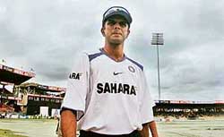 Rahul Dravid walks off the pitch after an inspection at the R. Premadasa Stadium in Colombo on Wednesday. 