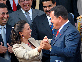 Venezuelas President Hugo Chavez dances with Colombian Foreign Minister Mana Consuelo Araujo after a meeting in the Miraflores presidential palace in Caracas, Venezuela, on Tuesday. 