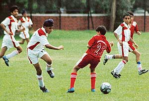 A match in progress between St Johns and Ryan International during the Chandigarh Sub-Junior (Boys) Under-16 Football Championship at the Sector 17 football stadium, Chandigarh, on Friday.