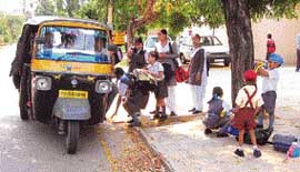 Schoolchildren in Mohali take on autorickshaw for their homes as school buses remained off the road on Friday. 