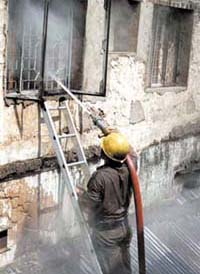 A fireman at the site of the fire.