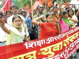Members of All India Student Association participating in a rally to demand Right to Education and Employment for All, at Parliament Street on Friday.