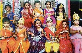 Students of Lily Buds school celebrate Janamashtami on the school campus. 