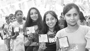 Students line up to cast their votes in the Students Council Association elections in Shimla on Saturday.