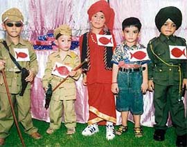Students of Cherry Field School dress up as soldiers and farmers at a function organised on the school premises on Saturday.
