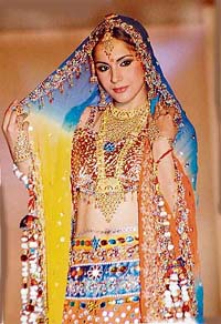 A model displays a creation of one of the contestants at Fashion Cocktails, presented by students of the INIFD, in Ludhiana on Sunday.