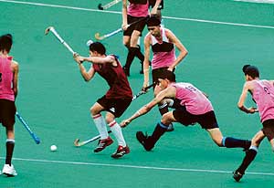 A hockey match in progres between Baba Bakala academy, Batala, and Baba Karam Singh Academy, Jalandhar, during the S.N. Vohra Memorial Under-14 Tournament in Chandigarh on Wednesday.