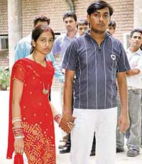 Santosh Kumar and Uma Aggarwal, who married for love and dragged to the district courts by their annoyed parents, appear before the judge on Wednesday.