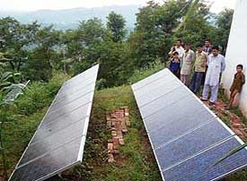 Residents of Nagnasu at the power house for solar energy in the village in Morni on Wednesday. 