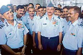 Air Marshal A. K. Singh, AOC-in-Chief, Western Air Command, with personnel of the IAF station, Halwara, during his visit to the station on Wednesday.