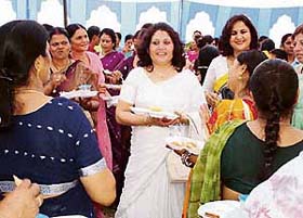 Ms Priya Singh, regional president of the Air Force Wives Welfare Association, Western Air Command, interacts with members of the association at Halwara, near Ahmedgarh, on Tuesday.
