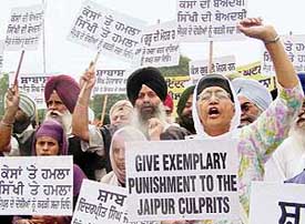 Sikhs protest against the forcible cutting of hair of a Jaipur boy in Mohali on Friday.