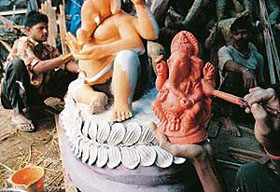 Final touches being given to the idol of Lord Ganesha at Kalibari in Chandigarh on Saturday. 