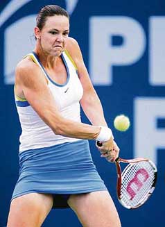 Lindsay Davenport returns a shot to Samantha Stosur during the semifinal of the Pilot Pen tennis tournament in New Haven, Connecticut, on Friday. Davenport won 7-6, 7-6 to set up the title clash with Justine Henin-Hardenne, who beat Svetlana Kuznetsova 6-3 6-3. 