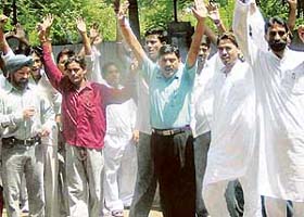 Protesters raise slogans inside the Phase-6 police station, Mohali