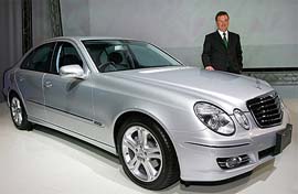 DaimlerChrysler Japan Co. Ltd. representative Director Hans Tempel introduces Mercedes-Benzs new model E-320 CDI in Tokyo on Monday.