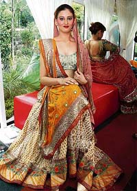 Models display creations of Sabyasachi Mukherjee, brand ambassador for wedding exhibition Celebrating Vivah, in New Delhi on Monday. The exhibition will start on September 1.