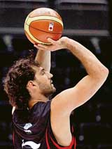 Spains Jorge Garbajosa takes part in a practice session in Saitama, Japan, on Monday. Spain take on Lithuania, while Argentina face Turkey in the quarterfinals of the World Basketball Championship on Tuesday. The USA will clash with Germany, while Greece square off against France in the quarterfinals on Wednesday.