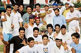 The cricket team of SD College, Sector 32, in a joyous mood after winning the inter-college Samuel Banerjee Trophy at DAV Senior Secondary School, Sector 8, in Chandigarh on Tuesday