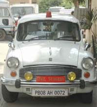 The official Ambassador car of Civil Surgeon Dr Avtar Singh Jarewal sports a red beacon in violation of official rules.