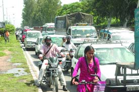 The picture was taken by The Tribune lensman Pawan Sharma from inside the bus, he was travelling from Chandigarh to Jalandhar.