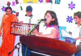 A teacher demonstrates the use of abacus in mental mathematics in a city school. 