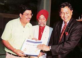 Mr Sanjay Sardana, Principal of Manav Mangal High School, Sector 21, Chandigarh, being awarded the International President’s Certificate of Appreciation at a function held at Mohali