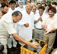 The Punjab Governor and UT Administrator, Gen S.F. Rodrigues (retd), plants a sapling at the inaugural function of the link road between Panchkula and Chandigarh near the IT Park in Panchkula