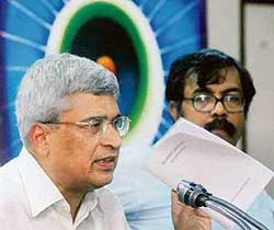 CPM general secretary Prakash Karat addresses a press conference in New Delhi on Wednesday. CPM leader Nilotpal Basu (right) is also seen in the picture. A document titled "Election Commission- A case for reform" was released during the press conference. 