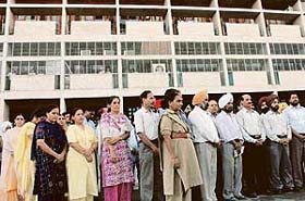 Punjab Civil Secretariat employees pay tributes to the late Beant Singh, former Punjab Chief Minister, and those killed with him in Chandigarh