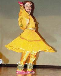 A dancer swirls during the solo kathak dance competition held in KVM School, Ludhiana
