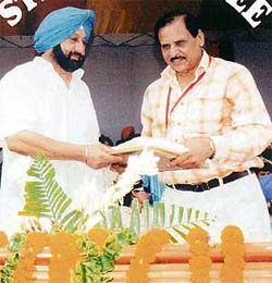 Lyricist Chan Goraya Wala receives the state award from the Chief Minister