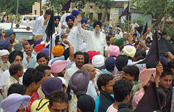 Senior Shiromani Akali Dal(SAD) leader Capt Kanwaljit Singh acknowledges the greetings of his supporters during a rally at Dera Bassi