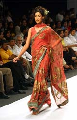 A model displays a creation by Puja Arya on the third day of the India Fashion Week in New Delhi on Friday.
