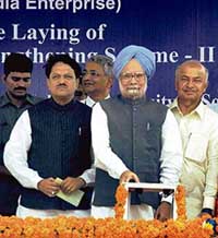 Prime Minister Manmohan Singh lays the foundation stone of the Western Region System Strengthening Scheme-II of Powergrid Corporation in Solapur on Friday. 