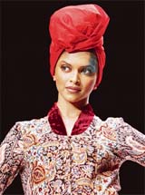 A model displays a creation by Meera and Muzaffar Ali on the fourth day of the India Fashion Week in New Delhi 