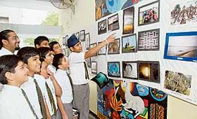 Students at a photo exhibition at St Johns School, Sector 26, Chandigarh