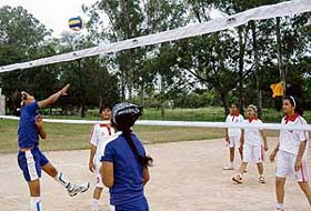 A match in progress during a girls volleyball tournament at Kendriya Vidyalaya, Air Force Station, High Grounds, Chandigarh