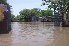 A view of exit gate of the waterlogged bus stand at Ahmedgarh.