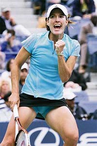 Belgiums Justine Henin-Hardenne celebrates her win over Japans Ai Sugiyama in the second round of the US Open in New York