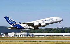 An Airbus A380 double-decker takes off on the first long-distance test-flight with hundreds of passengers on board drawn from Airbus staff and cabin design specialists in Toulouse, France