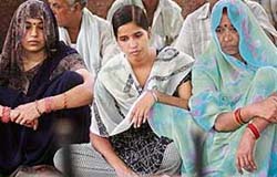 Family members of Subodh Tiwari, a 24-year-old marine engineer who died due to an accident on a foreign ship, sit in dharna demanding amendment to the Merchant Shipping Act at Jantar Mantar in New Delhi