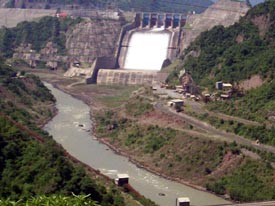 Water flows from spillways of Ranjit Sagar Dam for the first time.
