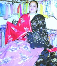 Jyoti Sandhu shows her craf items at her boutique-cum-workshop at Sarhali village.