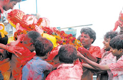 An idol of Lord Ganesha being taken to the the Yamuna for immersion by devotees at the end of the 10-day festivities in the Capital