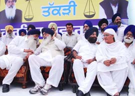 Mr Ajit Singh Kohar, MLA, Lohian, SAD chief, Mr Parkash Singh Badal, Mr Sarabjit Singh Makkar, Akali leader from Adampur, and Bibi Jagir Kaur, MLA, Bholath, during a rally at Adampur in Jalandhar district on Thursday.