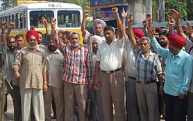Members of Punjab Roadways Transport Workers Union during a gate rally in Jalandhar on Thursday.