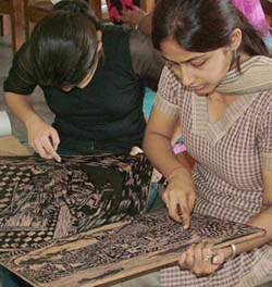 Students of Apeejay College of Fine Arts prepare material for block printing in Jalandhar on Thursday. 