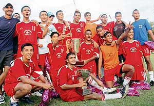 Team members of the Chandigarh Football Academy in a jubiliant mood after winning the 4th Administrator Cup at Sector 17 , Chandigarh , on Sunday.